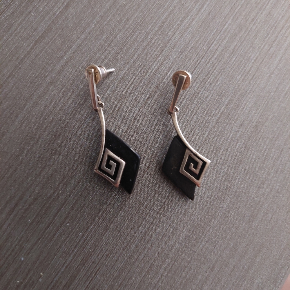 Sterling Silver drop earrings with dark amber. Dimond shaped. Greek pattern .